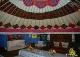 The word yurt is originally from a Turkic word referring to the imprint left in the ground by a moved yurt, and by extension, sometimes a person's homeland, kinsmen, or feudal appanage. The term came to be used in reference to the physical tent-like dwellings only in other languages.<br/><br/>

The Kazakhs (also Kazaks) are a Turkic people of the northern parts of Central Asia (largely Kazakhstan, but also found in parts of Uzbekistan, China, Russia, and Mongolia).