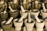 The fishing village of Ang Sila (see pxx) in Chonburi Province is renowned throughout the Eastern Seaboard and Bangkok for producing finely-crafted household implements such as pestles and mortars, as well as figurines of people and animals, from locally-sourced granite.