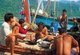 Thailand: Local fishermen eat lunch at the pier near Bang Bao fishing village, Ko Chang, Trat Province