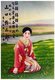 Japan: <i>Hikifuda</i> advertising poster depicting a young woman in a kimono. Late Meiji (1868-1912) period
