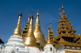 The golden stupa of the Shwedagon Pagoda rises almost 100 m (330ft) above its setting on Singuttara Hill and is plated with 8,688 solid-gold slabs. This central stupa is surrounded by more than 100 other buildings, including smaller stupas and pavilions.<br/><br/>

The pagoda was already well established when Bagan dominated Burma in the 11th century. Queen Shinsawbu, who ruled in the 15th century, is believed to have given the pagoda its present shape. She also built the terraces and walls around the stupa.<br/><br/>

The giant stupa has a circumference at platform level of 433 m (1,420ft), with its octagonal base ringed by 64 smaller stupas.