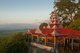 Burma / Myanmar: The setting sun lights a pavilion next to the Sutaungpyei Pagoda at the summit of Mandalay Hill, Mandalay
