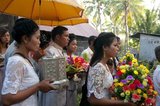 The traditional Khmer wedding is a long and colorful affair. Formerly it lasted three days, but since the 1980s it has more commonly lasted a day and a half.<br/><br/>

The ceremony begins in the morning at the home of the bride and is directed by the <i>achar</i> (a specialist in ritual who acts as a master of ceremonies). Buddhist priests offer a short sermon and recite prayers of blessing. Parts of the ceremony involve ritual hair cutting and tying cotton threads soaked in holy water around the couple's wrists.