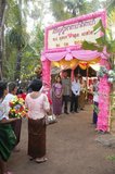 The traditional Khmer wedding is a long and colorful affair. Formerly it lasted three days, but since the 1980s it has more commonly lasted a day and a half.<br/><br/>

The ceremony begins in the morning at the home of the bride and is directed by the <i>achar</i> (a specialist in ritual who acts as a master of ceremonies). Buddhist priests offer a short sermon and recite prayers of blessing. Parts of the ceremony involve ritual hair cutting and tying cotton threads soaked in holy water around the couple's wrists.