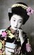 Japan: Hand-tinted portrait of a <i>maiko</i> (apprentice geisha), Osaka, c. 1910