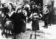 Poland/ Germany: Jewish men, women and children surrender to Nazi soldiers during the Warsaw Ghetto Uprising, May 1943