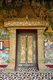 Laos: Main door leading into the viharn at 19th century Wat Sieng Mouan (Temple of Melodious Sounds), Luang Prabang
