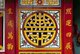 Vietnam: A symbolic representation of the Chinese character 'shou' or longevity in a window design at a Chinese family temple, Hoi An
