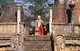Sri Lanka: A Buddhist monk walks in the 12th century Vatadage (circular relic house), Polonnaruwa