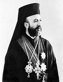 Makarios III, born Michail Christodoulou Mouskos (August 13, 1913 – August 3, 1977), was the archbishop and primate of the autocephalous Church of Cyprus, a Greek Orthodox Church (1950–1977), and the first President of the Republic of Cyprus (1960–1974 and 1974–1977).<br/><br/>

In his three terms as President of Cyprus (1960–1977), he survived four assassination attempts and a 1974 coup.