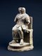 Egypt: Seated Horus in limestone, 1st-2nd century CE