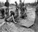 Japan / USA: Marines tend to a badly burned colleague, Battle of Peleliu, September-November 1944