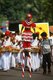 Sri Lanka: A boy on stilts at a temple festival in Avissawella, Western Province