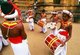 Sri Lanka: Traditional drummer boys at Kelani Temple near Colombo
