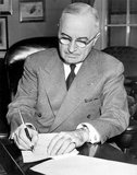 Harry S. Truman (May 8, 1884 – December 26, 1972) was the 33rd President of the United States (1945–53), an American politician of the Democratic Party. He served as a United States Senator from Missouri (1935–45) and briefly as Vice President (1945) before he succeeded to the presidency on April 12, 1945 upon the death of Franklin D. Roosevelt.<br/><br/>

He was president during the final months of World War II, making the decision to drop the atomic bomb on Hiroshima and Nagasaki. Truman was elected in his own right in 1948. He presided over an uncertain domestic scene as America sought its path after the war, and tensions with the Soviet Union increased, marking the start of the Cold War.