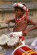 Sri Lanka: Traditional drummers boy at Kelani Temple near Colombo