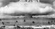 USA / Marshall Islands: Mushroom-shaped cloud and water column from the underwater Baker nuclear explosion of July 25, 1946. Photo taken from a tower on Bikini Island, 3.5 miles (5.6 km) distant