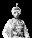 Bhupinder Singh was born at the Moti Bagh Palace, Patiala and educated at Aitchison College. At age 9, he succeeded as maharaja of Patiala state upon the death of his father, Maharaja Rajinder Singh, on 9 November 1900. A Council of Regency ruled in his name until he took partial powers shortly before his 18th birthday on 1 October 1909 and was invested with full powers by the Viceroy of India, the 4th Earl of Minto, on 3 November 1910.<br/><br/>

He served on the General Staff in France, Belgium, Italy and Palestine in the First World War as an Honorary Lieutenant-Colonel, and was promoted Honorary Major-General in 1918 and Honorary Lieutenant-General in 1931. He represented India at the League of Nations in 1925, and was chancellor of the Indian Chamber of Princes for 10 years between 1926 and 1938, also being a representative at the Round Table Conference. He married many times and had many children by his wives and concubines.