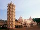 India: The lamp tower (Deep Stambha) and main temple buildings at the Shri Mangesh (Mangueshi) Temple, near Ponda, Goa