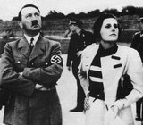 Helene Bertha Amalie 'Leni' Riefenstahl (22 August 1902 – 8 September 2003) was a German film director, producer, screenwriter, editor, photographer, actress, dancer, and propagandist for the Nazis.<br/><br/>

Adolf Hitler (20 April 1889 – 30 April 1945) was a German politician of Austrian origin who was the leader of the Nazi Party (NSDAP), Chancellor of Germany from 1933 to 1945, and Fuhrer ('leader') of Nazi Germany from 1934 to 1945.<br/><br/>

As dictator of Nazi Germany he initiated World War II in Europe and was a central figure of the Holocaust.