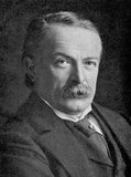 David Lloyd George, 1st Earl Lloyd-George of Dwyfor, OM, PC (17 January 1863 – 26 March 1945) was a British Liberal politician and statesman.<br/><br/>

As Chancellor of the Exchequer (1908–1915), Lloyd George was a key figure in the introduction of many reforms which laid the foundations of the modern welfare state. His most important role came as the highly energetic Prime Minister of the Wartime Coalition Government (1916–22), during and immediately after the First World War. He was a major player at the Paris Peace Conference of 1919 that reordered Europe after the defeat of Germany in the Great War.