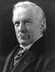 David Lloyd George, 1st Earl Lloyd-George of Dwyfor, OM, PC (17 January 1863 – 26 March 1945) was a British Liberal politician and statesman.<br/><br/>

As Chancellor of the Exchequer (1908–1915), Lloyd George was a key figure in the introduction of many reforms which laid the foundations of the modern welfare state. His most important role came as the highly energetic Prime Minister of the Wartime Coalition Government (1916–22), during and immediately after the First World War. He was a major player at the Paris Peace Conference of 1919 that reordered Europe after the defeat of Germany in the Great War.