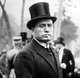 Italy: Benito Mussolini (1883-1945), Italian politician, fascist leader and dictator with cigarette and top hat, c. 1922