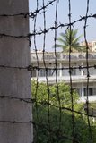 The Tuol Sleng Genocide Museum is a museum in Phnom Penh, the capital of Cambodia. The site is a former high school which was used as the notorious Security Prison 21 (S-21) by the Khmer Rouge communist regime from its rise to power in 1975 to its fall in 1979. Tuol Sleng means 'Hill of the Poisonous Trees' or 'Strychnine Hill'.<br/><br/>

The Khmer Rouge, or Communist Party of Kampuchea, ruled Cambodia from 1975 to 1979, led by Pol Pot, Nuon Chea, Ieng Sary, Son Sen and Khieu Samphan. It is remembered primarily for its brutality and policy of social engineering which resulted in millions of deaths. Its attempts at agricultural reform led to widespread famine, while its insistence on absolute self-sufficiency, even in the supply of medicine, led to the deaths of thousands from treatable diseases (such as malaria). Brutal and arbitrary executions and torture carried out by its cadres against perceived subversive elements, or during purges of its own ranks between 1976 and 1978, are considered to have constituted a genocide. Several former Khmer Rouge cadres are currently on trial for war crimes in Phnom Penh.