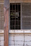 The Tuol Sleng Genocide Museum is a museum in Phnom Penh, the capital of Cambodia. The site is a former high school which was used as the notorious Security Prison 21 (S-21) by the Khmer Rouge communist regime from its rise to power in 1975 to its fall in 1979. Tuol Sleng means 'Hill of the Poisonous Trees' or 'Strychnine Hill'.<br/><br/>

The Khmer Rouge, or Communist Party of Kampuchea, ruled Cambodia from 1975 to 1979, led by Pol Pot, Nuon Chea, Ieng Sary, Son Sen and Khieu Samphan. It is remembered primarily for its brutality and policy of social engineering which resulted in millions of deaths. Its attempts at agricultural reform led to widespread famine, while its insistence on absolute self-sufficiency, even in the supply of medicine, led to the deaths of thousands from treatable diseases (such as malaria). Brutal and arbitrary executions and torture carried out by its cadres against perceived subversive elements, or during purges of its own ranks between 1976 and 1978, are considered to have constituted a genocide. Several former Khmer Rouge cadres are currently on trial for war crimes in Phnom Penh.