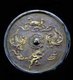 China: Bronze mirror with silver inlay decorated with two phoenixes and other mythical animals, Tang Dynasty (618-906 CE)