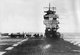 Japan: Imperial Japanese Navy aircraft carrier <i>Akagi</i> leaving Sulawesi in the Dutch East Indies / Indonesia, 26 March 1942. In the background are other carriers and battleships of the IJN carrier strike force