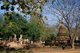 Thailand: Buddhas and the main chedi at Wat Phra Kaew, Kamphaeng Phet Historical Park