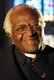 Desmond Mpilo Tutu, (born 7 October 1931) is a South African social rights activist and retired Anglican bishop who rose to worldwide fame during the 1980s as an opponent of apartheid.<br/><br/>

He was the first black Archbishop of Cape Town and bishop of the Church of the Province of Southern Africa (now the Anglican Church of Southern Africa).<br/><br/>

Since the demise of apartheid, Tutu has been active in the defence of human rights and uses his high profile to campaign for the oppressed. He has campaigned to fight HIV/AIDS, tuberculosis, poverty, racism, sexism, homophobia, and transphobia. He received the Nobel Peace Prize in 1984; the Albert Schweitzer Prize for Humanitarianism in 1986; the Pacem in Terris Award in 1987; the Sydney Peace Prize in 1999; the Gandhi Peace Prize in 2007; and the Presidential Medal of Freedom in 2009.