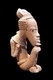 Nigeria: Nok culture image of a person resting his chin on his knee, terracotta, BCE 500 - 500 CE, The Louvre, Paris