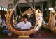Thailand: A young man plays the <i>khong mon</i>, a gong-circle instrument, in a traditional Thai orchestra, Bangkok