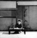 Japan: Yasunari Kawabata (1899 -1972), novelist and essayist, writing at his desk, c. 1946