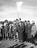 The Ottoman Mayor of Jerusalem, Hussein Effendi el Husseini (al-Husseini), meeting with Sergeants Sedgwick and Hurcomb of the 2/19th Battalion, London Regiment, under the white flag of surrender, at 8 am, 9 December, 1917.