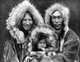 USA / Alaska: An Inupiat Eskimo family group including mother, father, and son, Noatak, Edward Sheriff Curtis, c. 1929