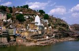 Omkareshwar Mahadev is a Hindu temple dedicated to the God Shiva. It is one of the 12 revered Jyotirlinga shrines of Shiva.<br/><br/>

The <i>jyothirlinga</i> shrines are places where Shiva appeared as a fiery column of light. Originally there were believed to be 64 <i>jyothirlinga</i>s while 12 of them are considered to be very auspicious and holy. Each of the twelve <i>jyothirlinga</i> sites take the name of the presiding deity - each considered a different manifestation of Shiva. At all these sites, the primary image is the <i>lingam</i> symbolizing the infinite nature of Shiva.