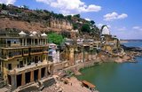 Omkareshwar Mahadev is a Hindu temple dedicated to the God Shiva. It is one of the 12 revered Jyotirlinga shrines of Shiva.<br/><br/>

The <i>jyothirlinga</i> shrines are places where Shiva appeared as a fiery column of light. Originally there were believed to be 64 <i>jyothirlinga</i>s while 12 of them are considered to be very auspicious and holy. Each of the twelve <i>jyothirlinga</i> sites take the name of the presiding deity - each considered a different manifestation of Shiva. At all these sites, the primary image is the <i>lingam</i> symbolizing the infinite nature of Shiva.