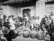 China: Roman Catholic orphanage at Kiukiang / Jiujiang, nuns inspecting babies in baskets, Edward Bangs Drew (1843 - 1924), 1892