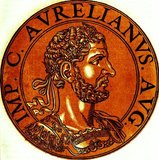 Aurelian (214/215-275 CE) rose from humble beginnings, and earned his way through the ranks of the Roman Army to a position of power and influence under Emperor Claudius Gothicus. After a brief few months when the throne was seized by Claudius' brother, Quintillus, after the former's death in 270, Aurelian ascended to become emperor by the will of his soldiers.<br/><br/>

Like Claudius before him, Aurelian had inherited an Empire that had been effectively broken into three pieces, with the Gallic Empire in the West and the Palmyrene Empire to the East. Various Germanic and barbarian tribes also threatened the Roman Empire, and he set to work defeating them all. By 273, the Palmyrene Empire had fallen to his armies, while he conquered the Gallic Empire the following year, reuniting the Roman Empire into one complete whole once more. This feat ended the Crisis of the Third Century. <br/><br/>

Aurelian's disdain for corruption within both his own soldiers and officials, resulting in severe punishments for anyone found guilty, eventually led to his death when a fearful secretary forged a document listing officials marked for execution by the emperor. These officials, including high-ranking officers of the Praetorian Guard, feared for their lives and murdered Aurelian. It is believed that his wife, Ulpia Severina, ruled briefly alone for a period of time before a new emperor was proclaimed, becoming the only known woman to have ruled the entire Roman Empire on her own.