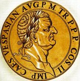 From an equestrian family that rose to senatorial rank under the Julio-Claudian dyansty, Vespasianus - as he was then called - earned much renown through his military record. He first served during the Roman invasion of Britain in 43 CE, and was later sent by Emperor Nero to conquer Judea in 66 CE, during the Jewish rebellion.<br/><br/>

During his siege of Jerusalem, news came to him of Nero's suicide and the tumultuous civil war that happened afterwards, later known as the Year of the Four Emperors. When Vitellius became the third emperor in April 69, the Roman legions of Egypt and Judea declared Vespasian the new emperor. Marching to Rome, he defeated and executed Vitellius, becoming emperor and ending the Year of the Four Emperors.<br/><br/>

He ruled the Roman empire for 10 years, building the Flavian Amphitheatre, known nowadays as the Roman Colosseum, as well as enacting various reforms to the empire. He died in 79 CE, and his son Titus became the next Roman emperor, starting the Flavian dynasty and making Vespasian the first emperor to be directly succeeded by his own natural son.