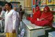 India: A priest leads <i>Makara Sankranti</i> celebrations at the old Hindu Shri Swaminarayan Mandir (Swaminarayan Temple), built in 1824 and destroyed during the 26 January 2001 earthquake, Bhuj, Gujarat (1997)