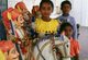India: Children at the Jakh Temple of Kutch (<i>Jakh Botera</i>), dedicated to the 72 Jakhs or Yaksha warriors, Kutch, Gujarat State