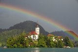 Lake Bled is a lake in the Julian Alps of the Upper Carniolan region of northwestern Slovenia, where it adjoins the town of Bled.<br/><br/>

The lake surrounds Bled Island. The island has several buildings, the main one being the pilgrimage church dedicated to the Assumption of Mary, built in its current form near the end of the 17th century, and decorated with Gothic frescos from around 1470 in the presbyterium.