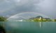 Slovenia: A rainbow arches over Bled Castle and  Bled Island, Lake Bled