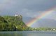 Slovenia: A rainbow at Lake Bled with Bled Castle overlooking the lake