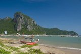 Located about 16 kilometers (10 miles) south of Prachuap Khiri Khan, Hat Wa Kaw is a beautiful, casuarina-lined beach ringing a small bay.