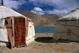 Two small settlements of Kirghiz (Kyrgyz or Kirgiz) nomads lie by the side of Lake Karakul high up in the Pamir Mountains. Visitors can stay overnight in one of their mobile homes or yurts – Kirghiz men will approach travellers as they arrive at the lake and offer to arrange this accommodation. The Kyrgyz form one of the 56 ethnic groups officially recognized by the People's Republic of China. There are more than 145,000 Kyrgyz in China.<br/><br/>

The Zhongba Gonglu or Karakoram Highway is an engineering marvel that was opened in 1986 and remains the highest paved road in the world. It connects China and Pakistan across the Karakoram mountain range, through the Khunjerab Pass, at an altitude of 4,693 m/15,397 ft.